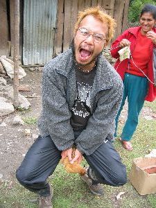Kevin mounting a chicken on the inca trail, Peru