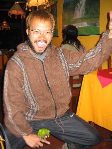 Kevin mounting a parrot in Aguas Calientes, Peru